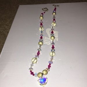A hand made Swirsky crystal heart pendant necklace